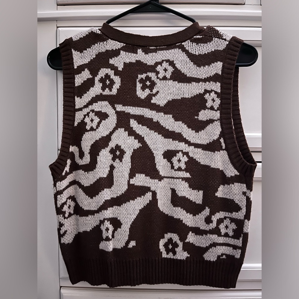 Women’s brown and white flower sweater vest
